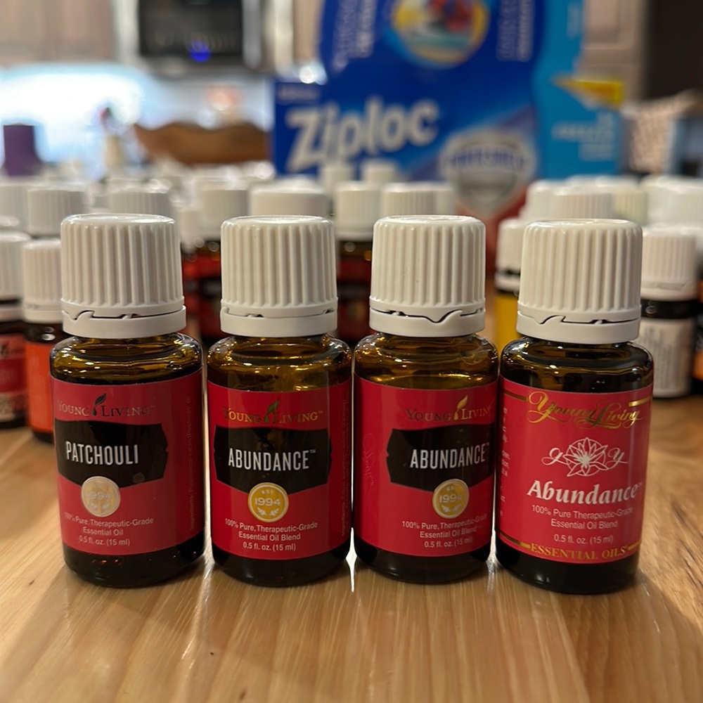 Young Living (4) 15ml  bottles of abundance essential oil